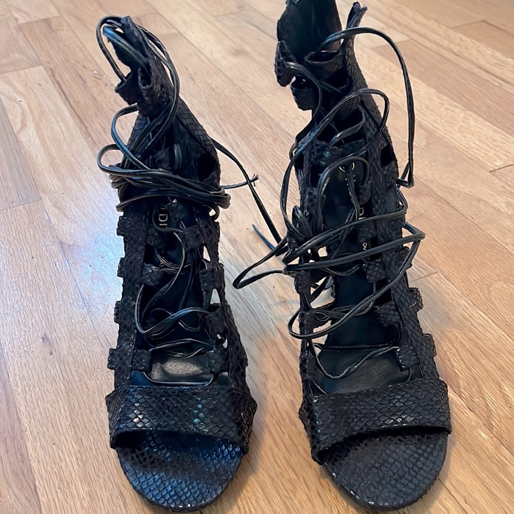 Laced up snake skin heels